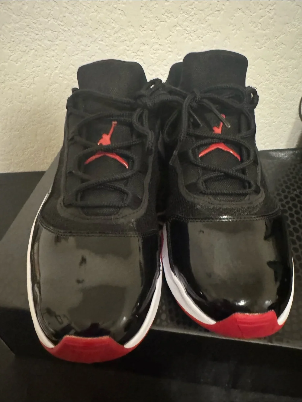 Jordan 11 CMFT Bred Black and Red Low-Top Sneakers